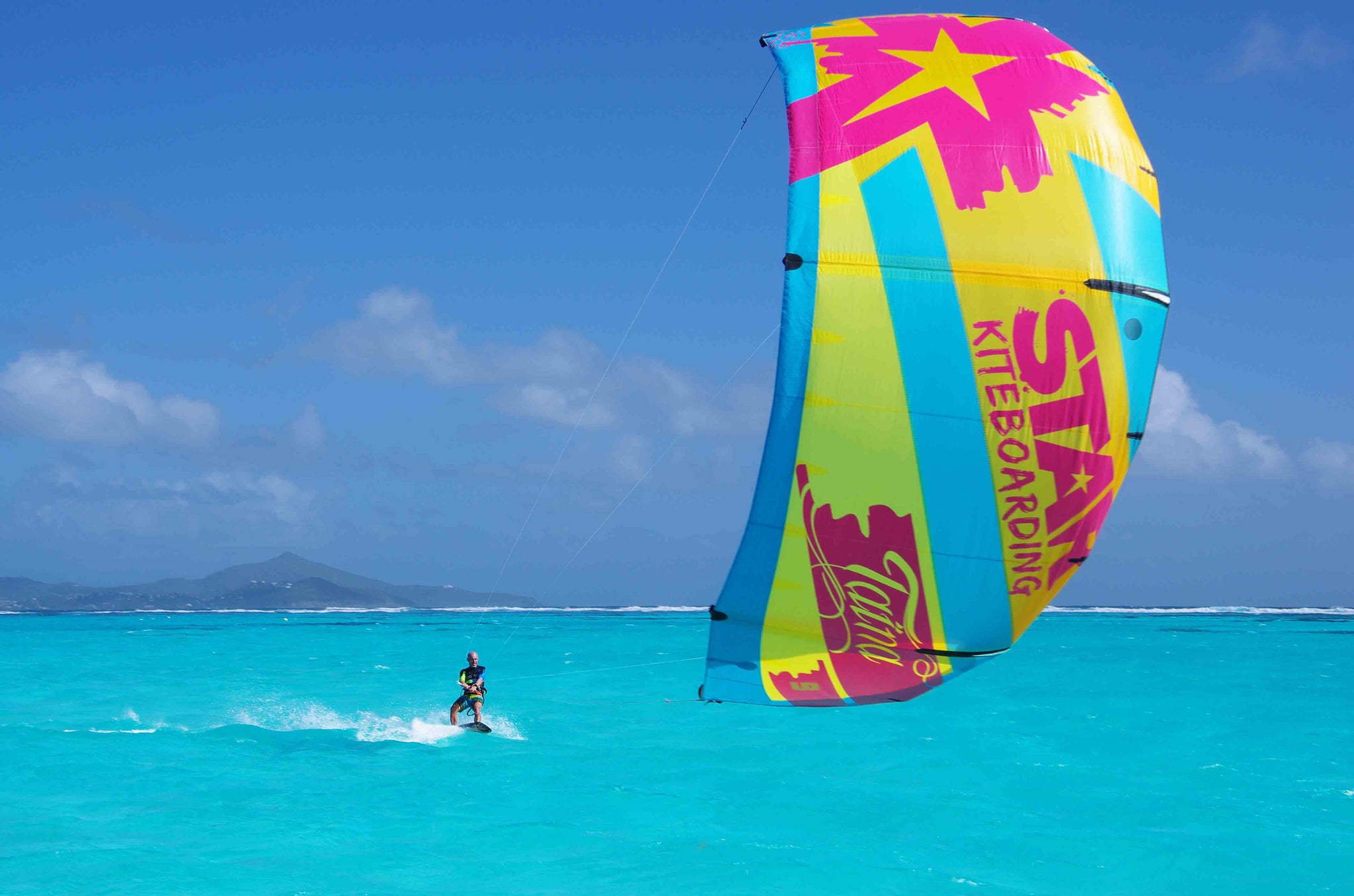 IN THE OPEN – MARTNIQUE STAR partner, offering CATAMARAN dream kite trip in the BVI and GRENADINES